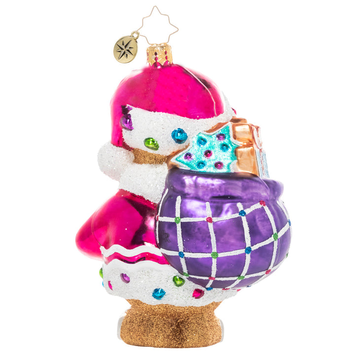 Back - Ornament Description - Gingersnap Santa: Gingerbread Santa is cute as a button! He's ready to make the holiday super sweet with his bag full of treats.