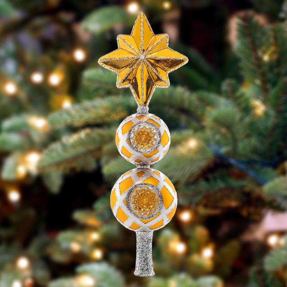 Ornament Description - Christmas Star Finial: Let this glorious gilded star serve as your guide this Christmas, shining as a beacon of classic holiday cheer atop your tannenbaum.
