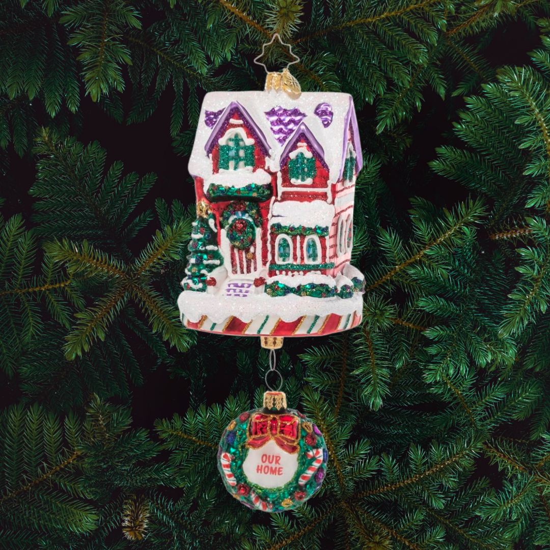 Ornament Description - The Claus' Fixer Upper: Santa works hard all year building toys, so he knows all about manual labor. This ornament features Santa and Mrs. Claus fixing up their house – perfect for the handy new homeowner.