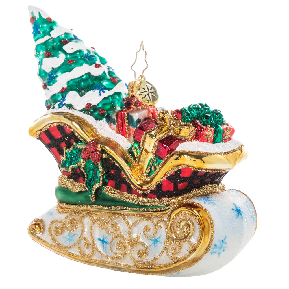 Front - Ornament Description - Snowy Sleigh Ride: This delightful sleigh is packed to the gills with everything you need for a joyful Christmas, even the tree. 