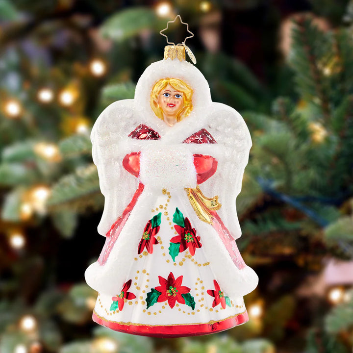 Ornament Description - Holiday Joy Angel: Positively angelic in classic Christmas poinsettias, this gorgeous guardian is ready to grace your tree with joy and love.
