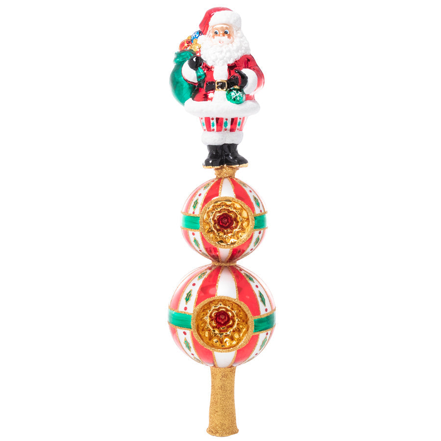 Front - Finial Description - Christmas Classics Finial: Top the tree with good cheer with this Santa finial inspired by classic Christmas tradition. Standing tall above two golden starbursts, Santa is the perfect finishing touch to your tree!