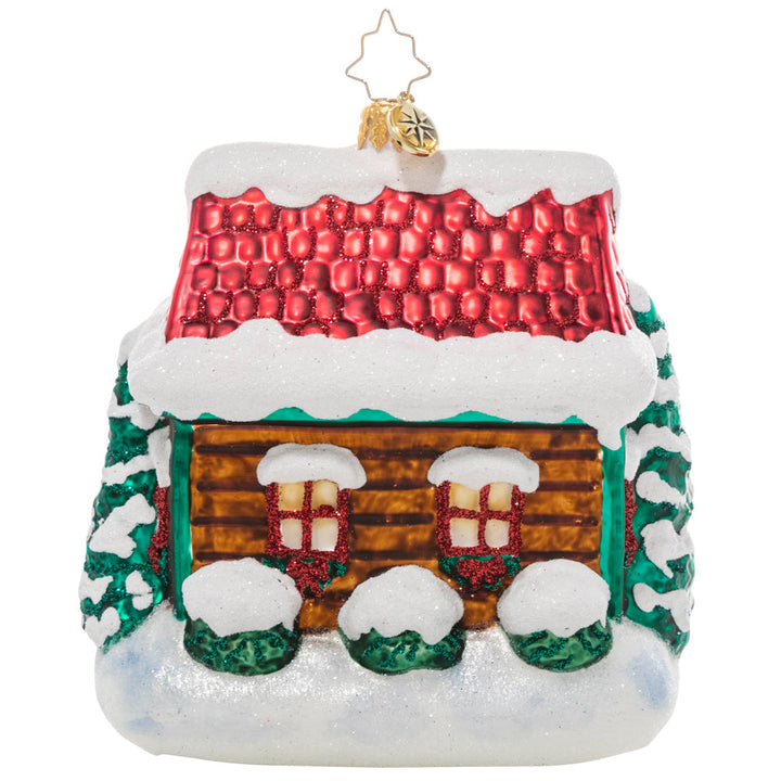 Back - Ornament Description - The Coziest Cottage: The snow is coming down! Drifts are piling up and this little cottage is looking cozier by the minute with its holiday lights and a festive wreath.