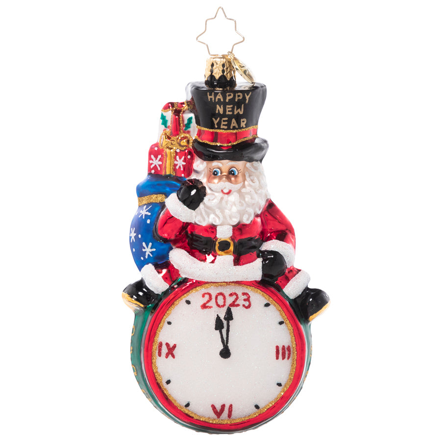 Front - Ornament Description - Counting Down to 2023: Tick, tock, tick, tock… all eyes are on the clock! Santa merrily leads the big countdown to midnight on New Year's Eve.
