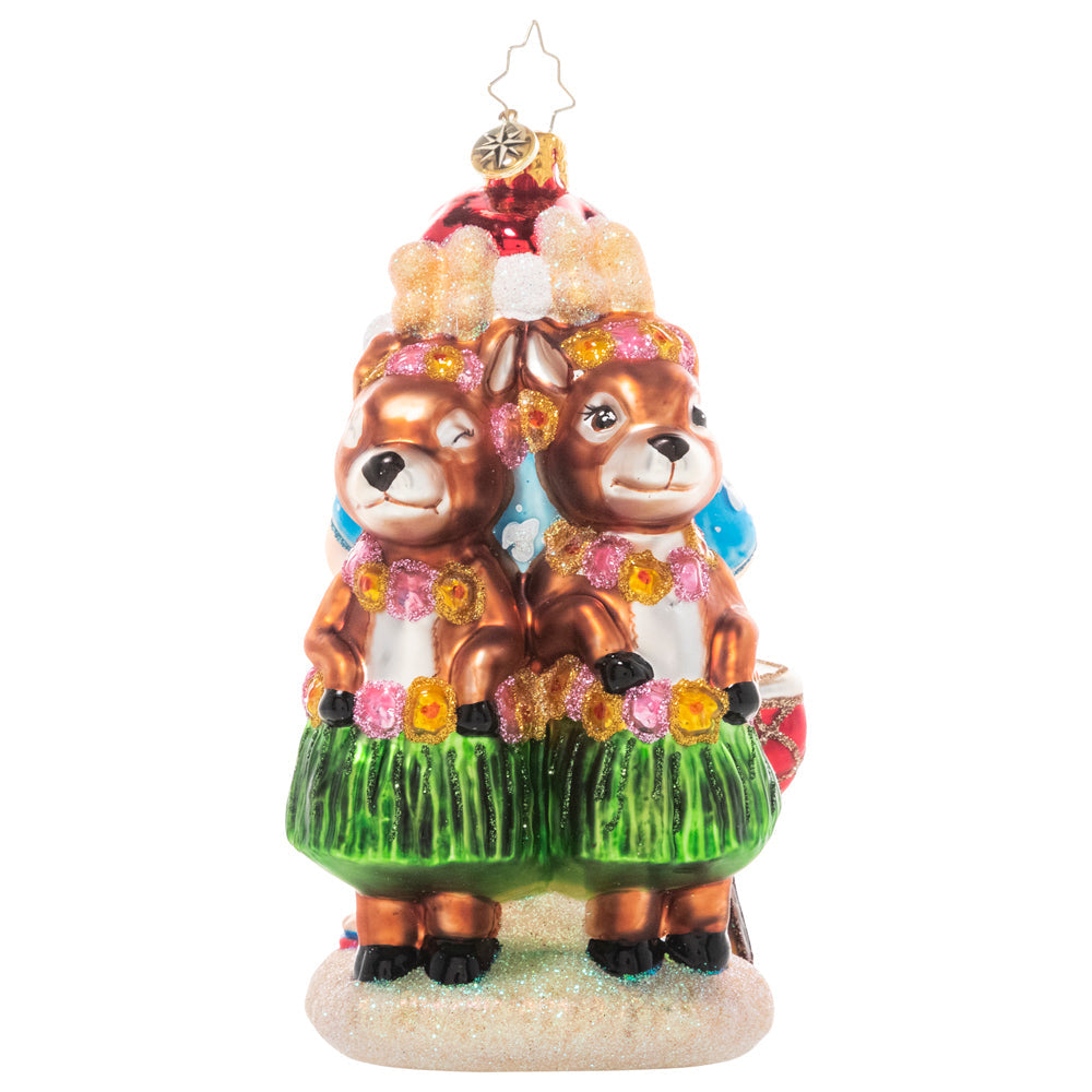 Back - Ornament Description - Ho Ho Hula: Mele Kalikimaka! Santa says "Aloha" from the islands on his annual vacation with his loyal reindeer team – turns out they are not just excellent as sled leaders, but as backup dancers too!