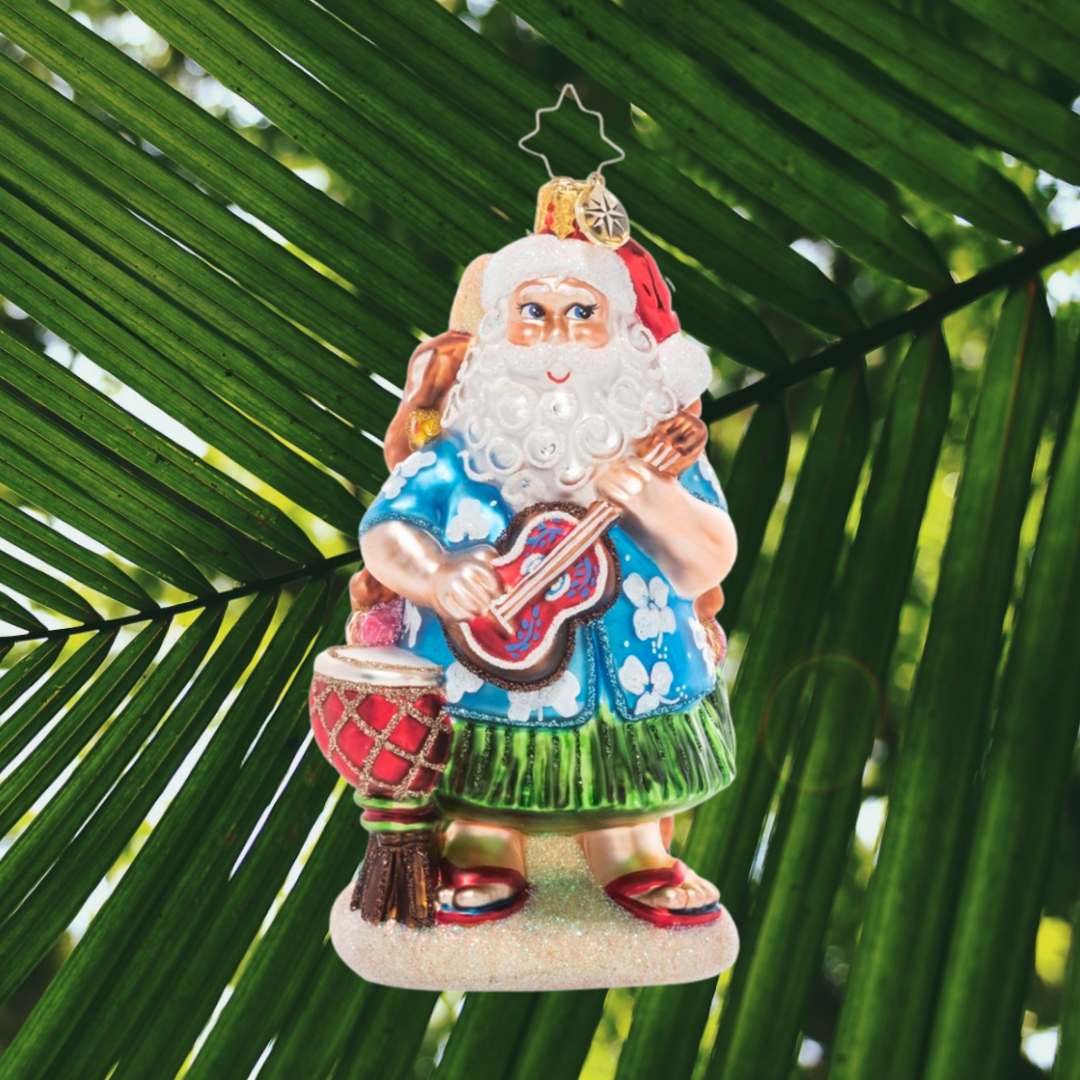 Ornament Description - Ho Ho Hula: Mele Kalikimaka! Santa says "Aloha" from the islands on his annual vacation with his loyal reindeer team – turns out they are not just excellent as sled leaders, but as backup dancers too!