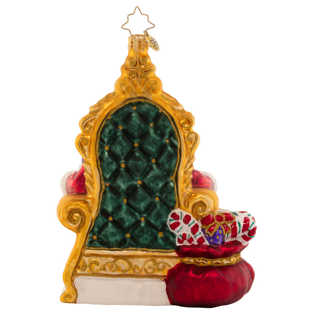Back - Ornament Description - Strike A Pose Santa: Perfectly poised in a comfy chair surrounded by gifts, Santa is ready to listen to the Christmas wish lists from the good little girls and boys.