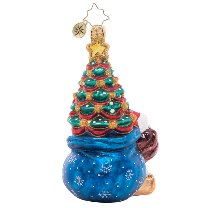 Back - Ornament Description - Cub's First Christmas: This brave little lion cub has a bag full of fun trailing behind him, ready to make baby's first Christmas extra special!