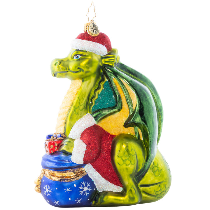 Side 2 of 2 - Ornament Description - Fire-Breathing Friend: Never fear, this majestic green dragon is only here to spread Christmas cheer! He's an absolutely resplendant reptile in a red coat and festive Santa hat.