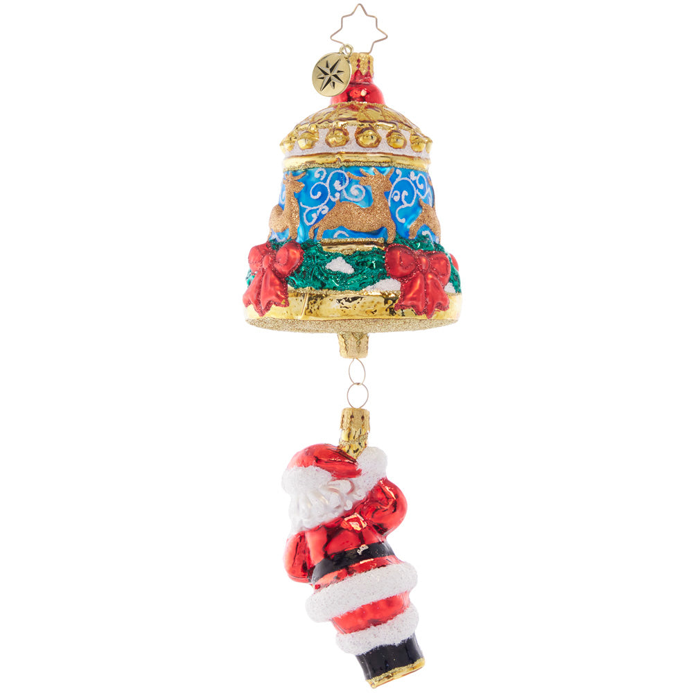 Back - Ornament Description - Swinging Santa: Swinging from a beautiful Christmas bell adorned with deer and red roses, Santa is ringing in the holiday for all to hear.