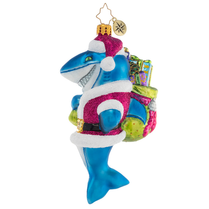 Side View 2 of 2 - Ornament Description - Santa Jaws: Shining and smiling with a bag full of gifts, this jolly Santa-Jaws ornament is nothing to be afraid of! He's spreading Christmas cheer all across the deep blue sea with his bounty of presents.