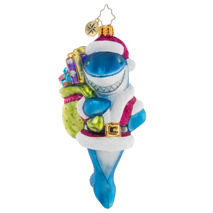 Front - Ornament Description - Santa Jaws: Shining and smiling with a bag full of gifts, this jolly Santa-Jaws ornament is nothing to be afraid of! He's spreading Christmas cheer all across the deep blue sea with his bounty of presents.