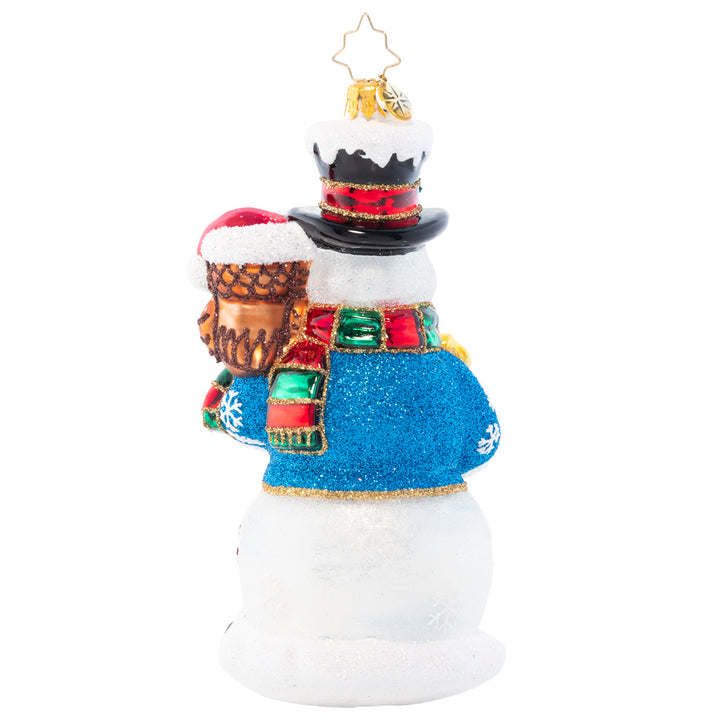 Back - Ornament Description - Woodland Friend Snowman: Sprinkled with fresh snow and surrounded by his best woodland friends, this snowman is bringing some holiday festivity to the wintry forest.