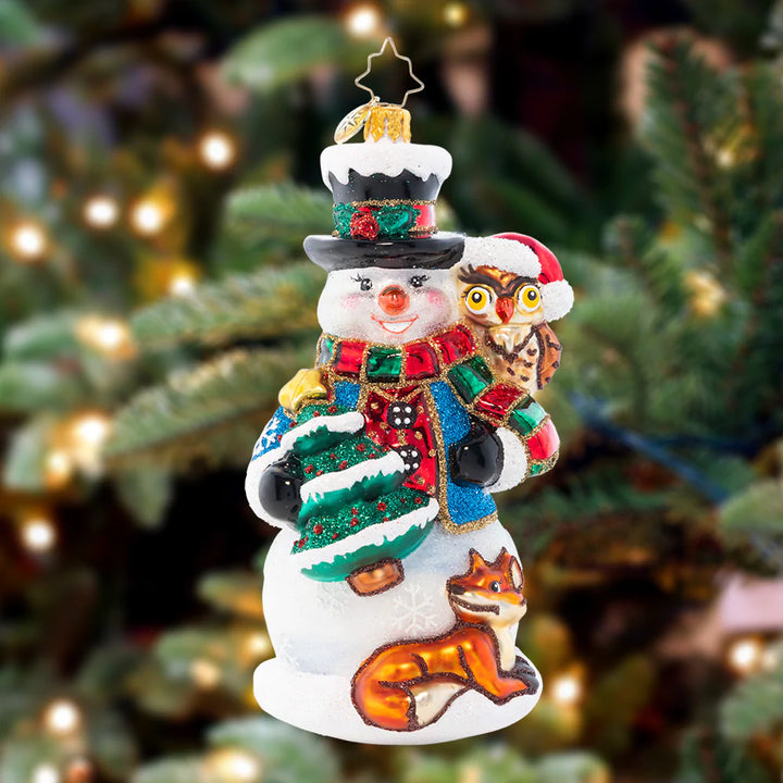Ornament Description - Woodland Friend Snowman: Sprinkled with fresh snow and surrounded by his best woodland friends, this snowman is bringing some holiday festivity to the wintry forest.