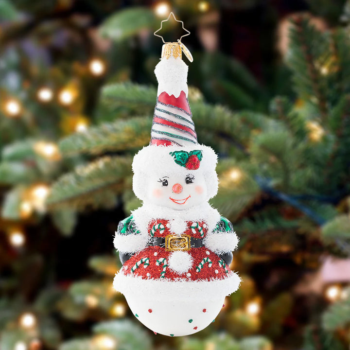 Ornament Description - Twice As Nice Snowman: This snowman is anything but two-faced – he's actually twice as cheerful! With peppermint swirls and cute candy canes, this dual-sided piece is perfect from every angle.