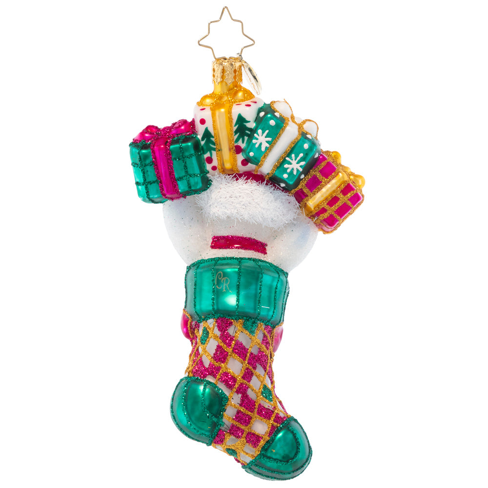 Back - Ornament Description - Stocking Stuffer: A polar bear surprise is a welcomed holiday prize! With gifts in store in this stocking, that'll have all the recipients talking.