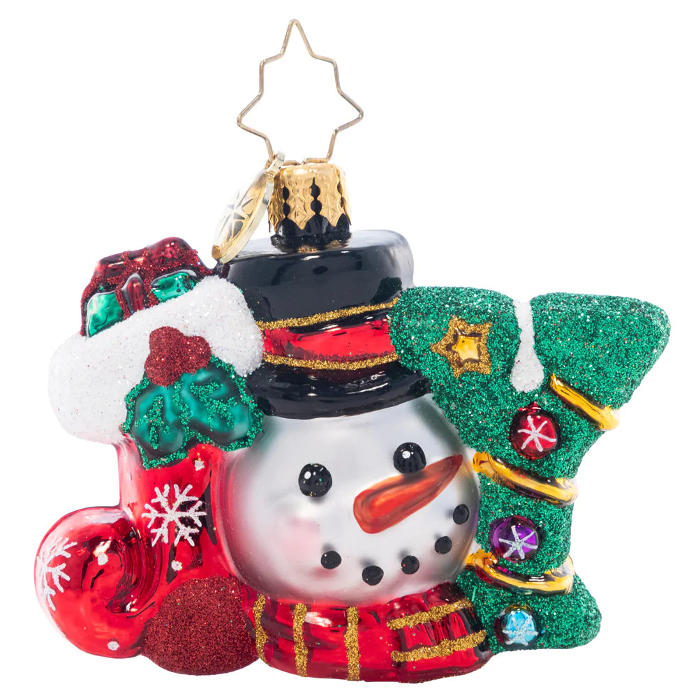 Ornament Description - A Joyful Holiday Gem: You can't spell "jolly" without J-O-Y! A similing smowman peeks out from this joyous Little Gem, which spells out the spirit of the holiday season.