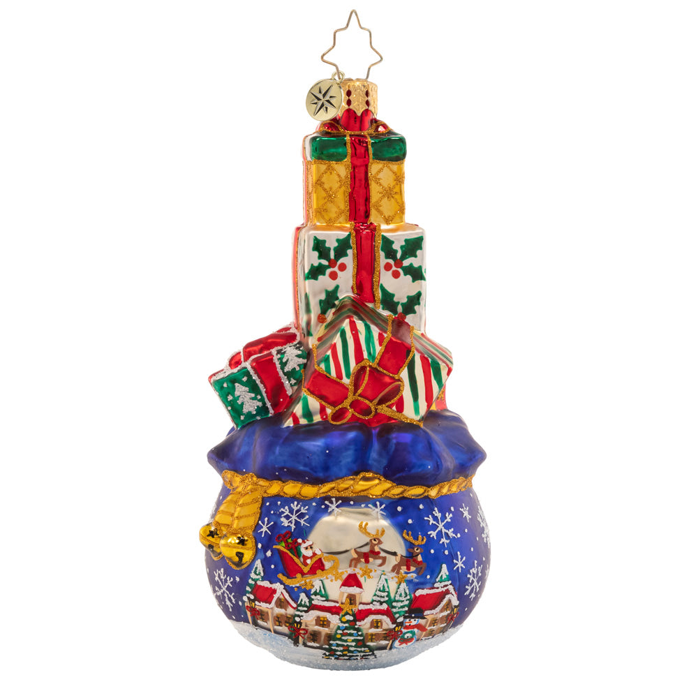 Front - Ornament Description - Gift Delivery: This tower of good tidings is full to the brim with Christmas presents. Looks like there were lots of good little girls and boys on the nice list this year!