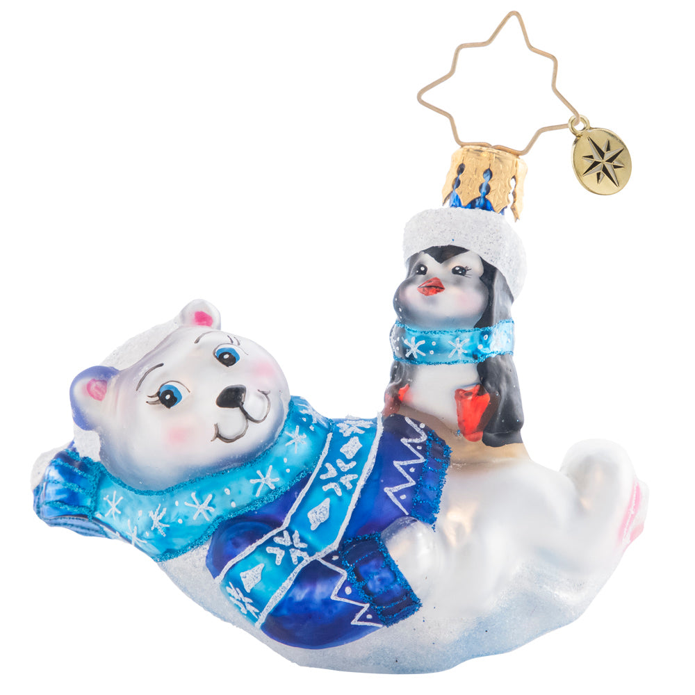 Front - Ornament Description - Perfect Polar Pals Gem: Laid-back and lounging in a snowflake-covered Christmas sweater and scarf, these polar bear and penguin pals are the definition of chill.