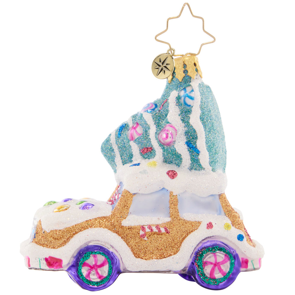 Back - Ornament Description - Candy Tree Delivery Gem: Yippee! Time to take the tree home to the Candy Chalet for Christmastime. This gingerbread-mobile is the sweetest ride to get the job done!