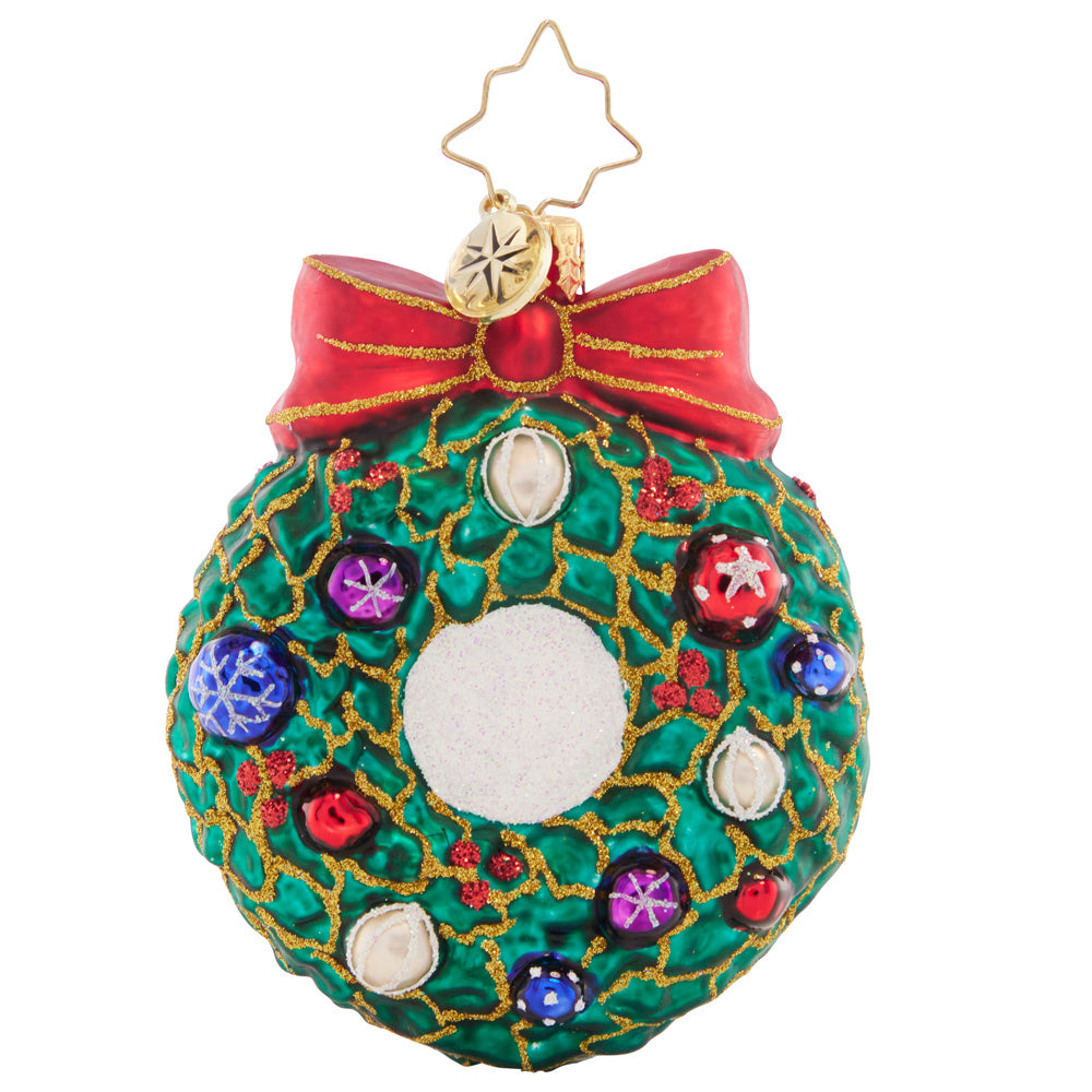 Back - Ornament Description - Smiling Through 2023 Gem: Perfectly perched within a wintry wreath, Santa celebrates 2023 with gorgeous, glistening ornaments. 