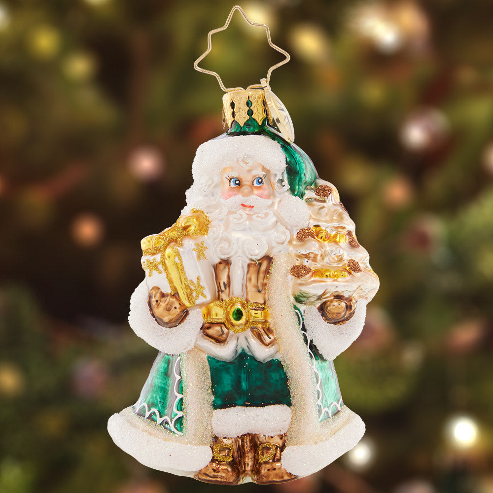 Ornament Description - Emerald City Santa Gem: Elegant as ever in emerald green, Santa is ready to style and smile at a Christmas party!