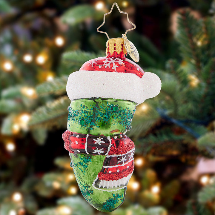 Ornament Description - Chilly Christmas Pickle Gem: You're sure to be in a pickle if you try to find this darling ornament nestled among the tree branches! Honor the traditional Christmas pickle-hunt with this whimsical piece.