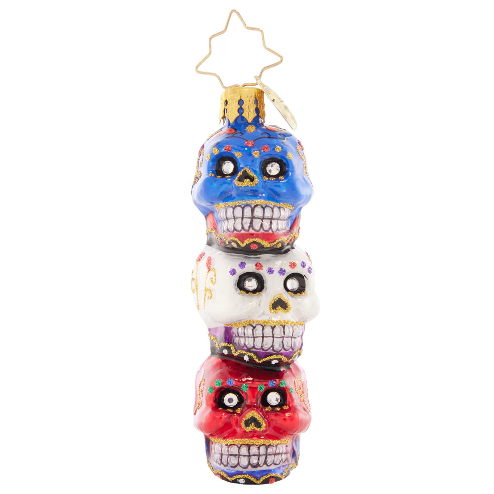 Front - Ornament Description - Spooky Sugar Skulls Gem: These three sparkly skulls are a spooky stack to adorn your tree! Painted ornately to pay homage to the Day of the Dead, this is a unique and beautiful piece.