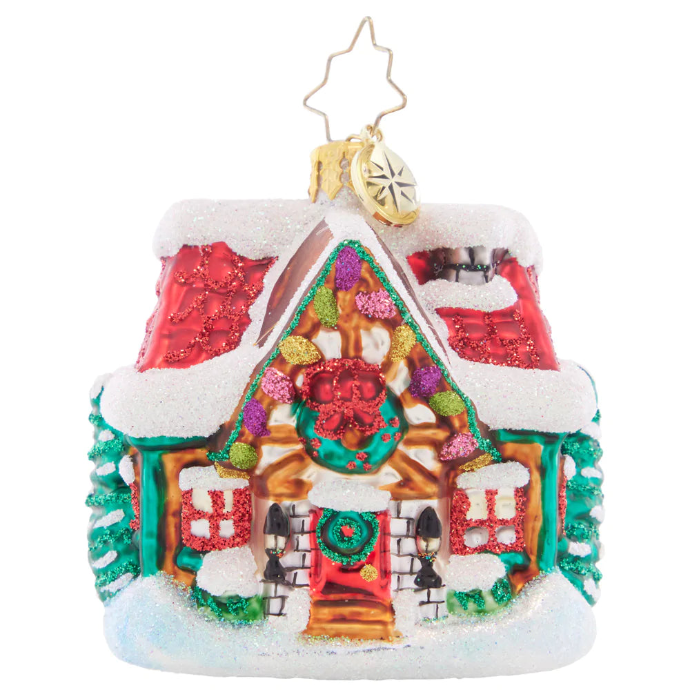 Front - Ornament Description - The Coziest Cottage Gem: Covered in deep snow drifts, this little cottage is cozy warm on the inside. The perfect spot to warm up with some milk and cookies on Christmas Eve!