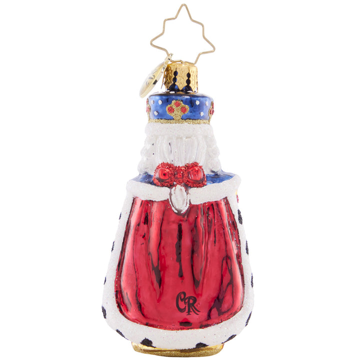 Back - Ornament Description - Nutcracking Royalty Gem: All hail this regal nutcracker! This little gem spares none of the pomp and circumstance, presenting a regal protector dressed in royal blue and a fur-lined cape.