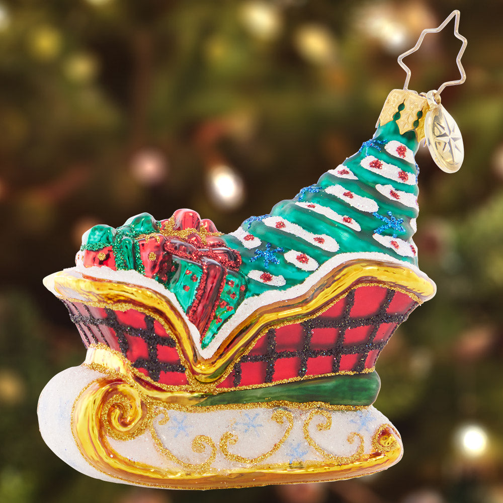 Ornament Description - Snowy Sleigh Ride Gem: Packed full of gifts and a beautifully-trimmed tree, this snow-speckled sleigh has everything you need for a wonderful Christmas!