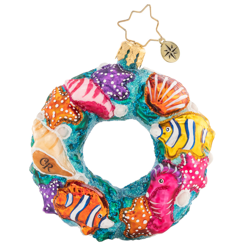 Back - Ornament Description - Under The Sea Wreath Gem: This undersea wreath is covered in colorful nautical creatures! It's the perfect little piece to add tropical touch to your tree.