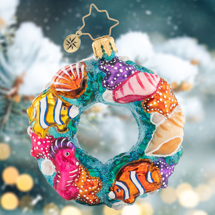 Ornament Description - Under The Sea Wreath Gem: This undersea wreath is covered in colorful nautical creatures! It's the perfect little piece to add tropical touch to your tree.