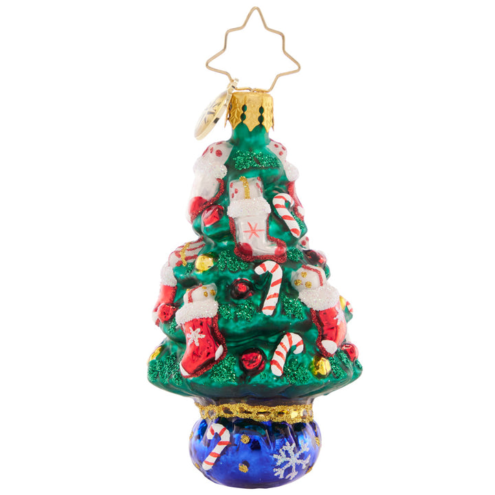 Back - Ornament Description - Candy Cane Conifer Gem: This tasty tree is trimmed with candy canes and gift-stuffed stockings – what a cute little treat to celebrate the holidays!