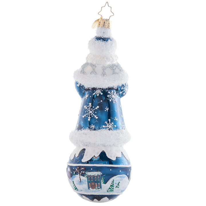 Back - Ornament Description - Snowy Serenity Santa: This snowflake-covered Santa stands upon a serene scene round, showcasing a beautiful silent night. This piece is an intricate and charming addition to any tree!