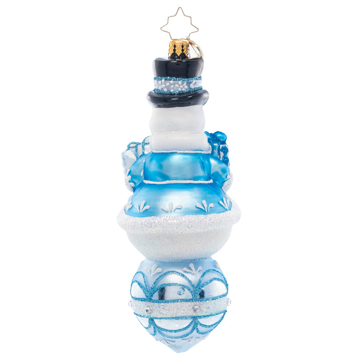 Back - Ornament Description - Frosty Snow Fellow: Looking extra frosty and fresh, this festive snow-fella is perched upon a radiant reflector drop.