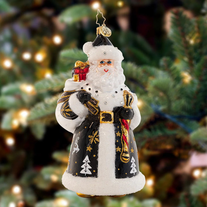 Ornament Description - Luxe Saint Nicholas: Looking luxurious as ever in a gold-accented black robe, Santa is ready to bring sumptous style to any Christmas soirée this season.