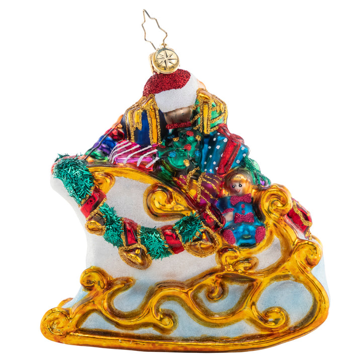 Back - Ornament Description - Santa's Gilded Glider: Gilded with gold and abounding with glorious gifts, this sleigh is a special sight to see the night before Christmas.