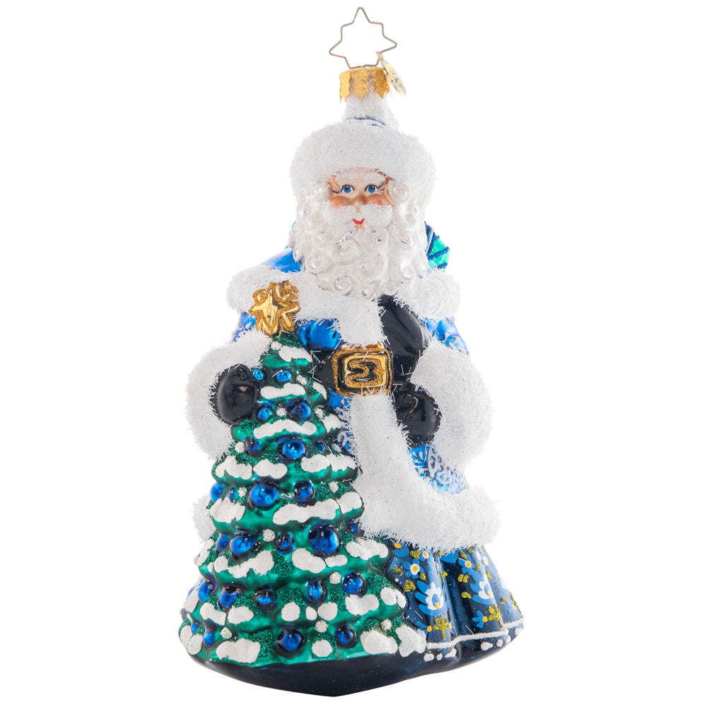 Front - Ornament Description - Winter Hues Santa: Dressed from head-to-toe in cool winter blues, Santa totes a splendid giftsack embellished with intricate snowflakes. Even his noble fir tree is trimmed in blue!