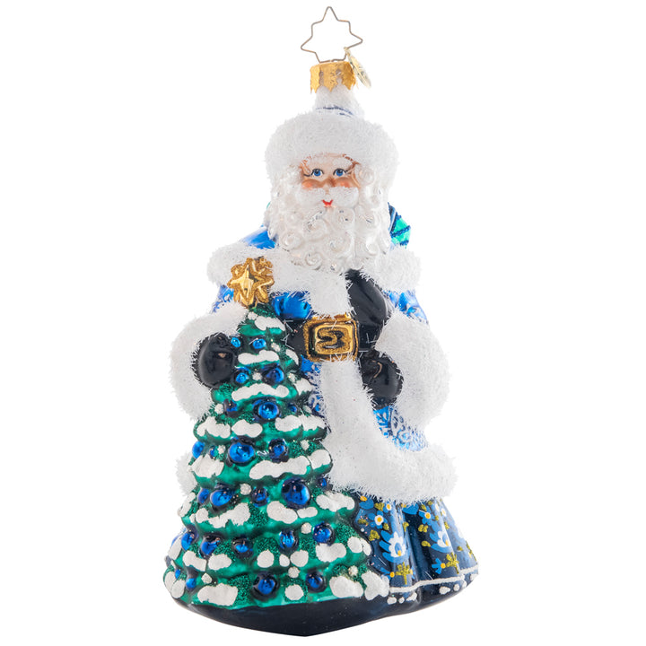 Front - Ornament Description - Winter Hues Santa: Dressed from head-to-toe in cool winter blues, Santa totes a splendid giftsack embellished with intricate snowflakes. Even his noble fir tree is trimmed in blue!