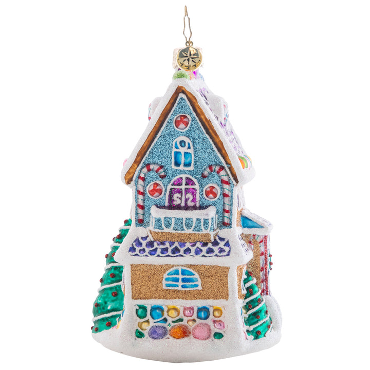 Side View - Ornament Description - Sweet Chalet: Charmingly dusted with icing snow drifts and colorful gumdrops, this magnificent tri-level treat is the sweetest gingerbread house on the block!