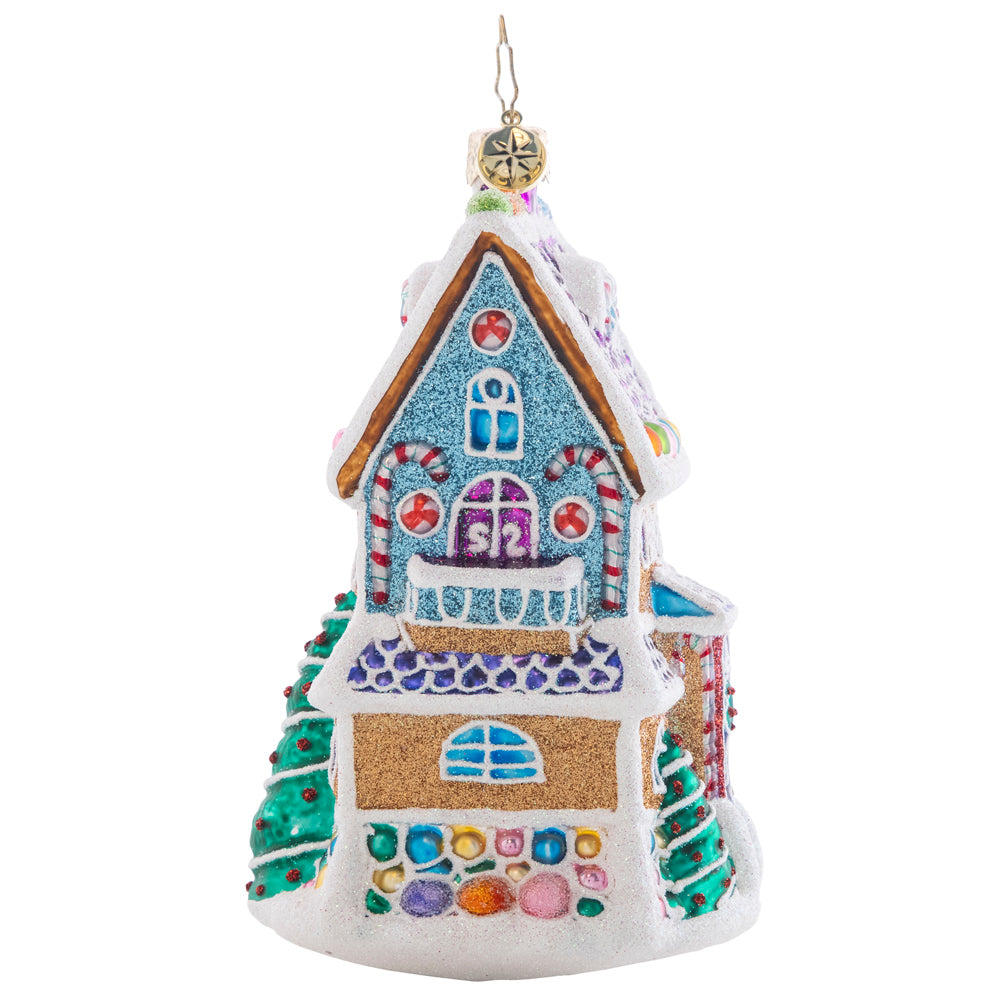 Side View - Ornament Description - Sweet Chalet: Charmingly dusted with icing snow drifts and colorful gumdrops, this magnificent tri-level treat is the sweetest gingerbread house on the block!