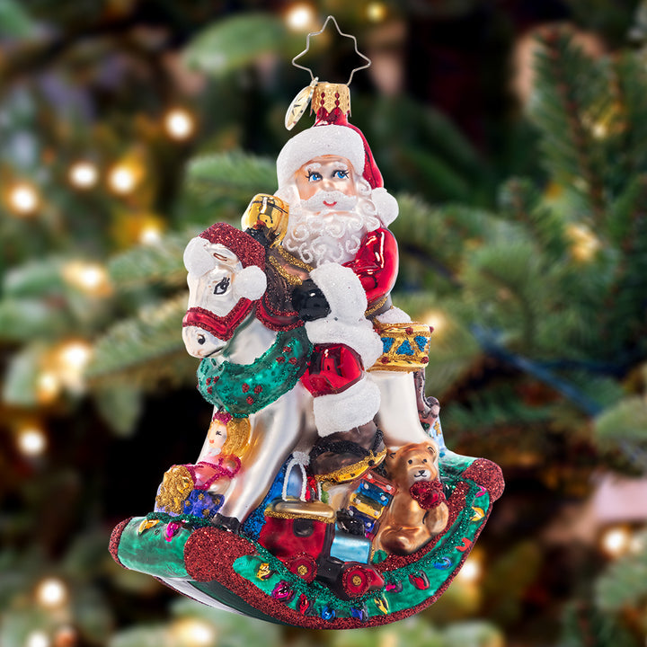Ornament Description - Rockin' Christmas Santa: Santa sure is rockin' right onto the Christmas tree with this charming toy horse. After all, he has to test the toys before gifting them to the good little girls and boys!