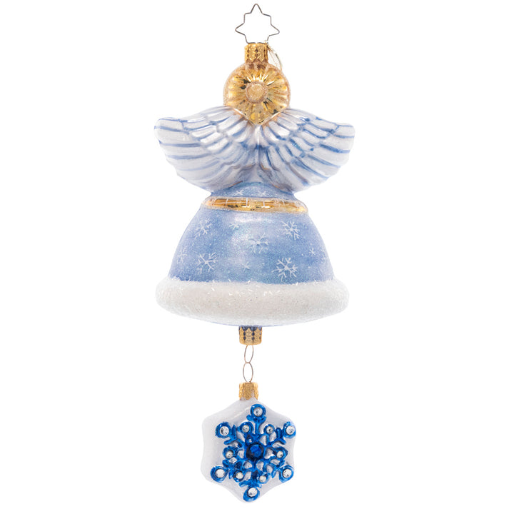 Back - Ornament Description - Sapphire Snow Angel: This stunning snow angel is dressed in an icy, shimmering saphhire robe. She shines as a bright beacon of hope through the cold winter night.