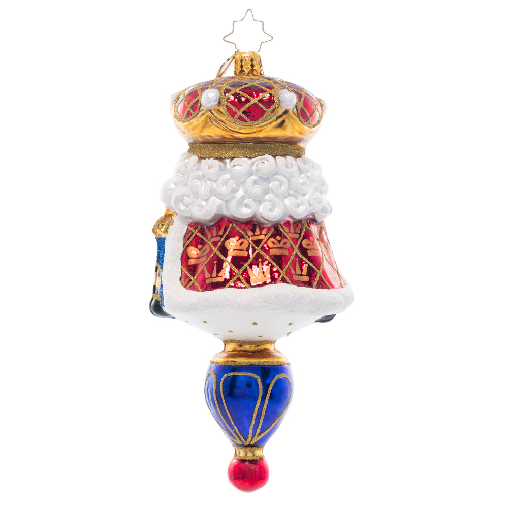 Back - Ornament Description - Royal Nutcracker: Regally enrobed in royal blue, this nutcracker king is just the thing to make your Christmas tree dazzle and delight. This special ornament has been hand-picked by the Radko team to be part of the Limited Edition collection.