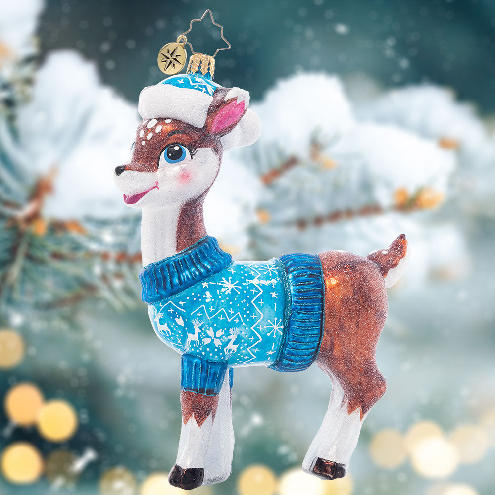 Ornament Description - Bundle Up Baby Deer: Fawn over the newest little one in your life with this adorable ornament, featuring a sweet baby deer wearing a cozy blue sweater and Santa hat.