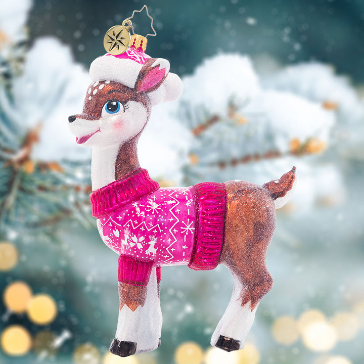 Ornament Description - Cozy Up Baby Deer: Fawn over your new arrival with this darling ornament, featuring a darling baby deer in a cozy pink sweater and Santa hat.
