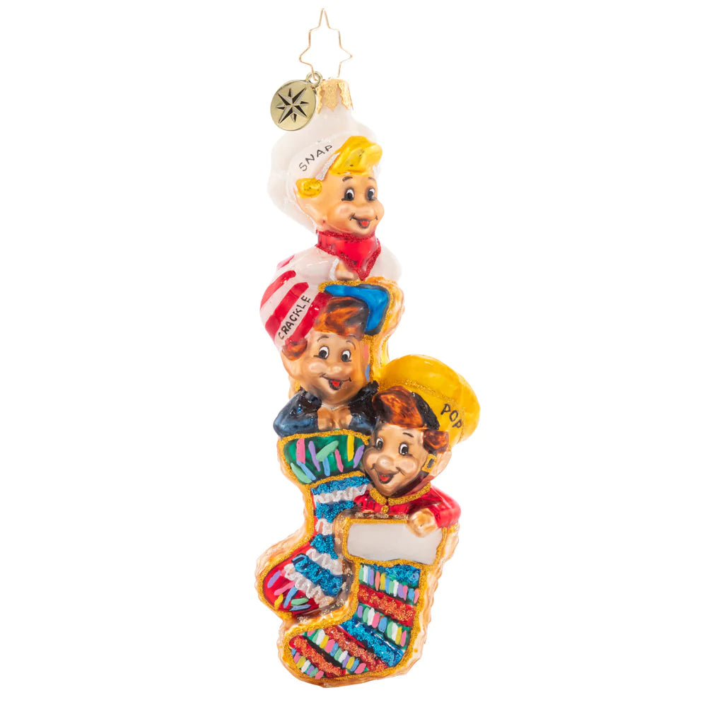 Front - Ornament Description - Snappy Stocking Stuffers: Imagine waking up Christmas morning and finding Snap! Crackle! And Pop! In your stockings…. I wouldn't complain! For an added surprise, turn them around and find that the stockings are actually everybody's favorite snack: Rice Krispies Treats!