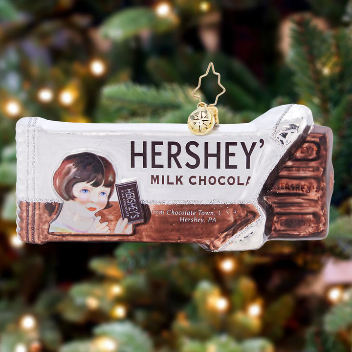 Ornament Description - Vintage Sweet Tooth: HERSHEY'S has been a sweet American staple for many years, and will continue to bring joy for generations to come. Bring the happy memories home to your Christmas tree with this vintage-inspired chocolate bar.