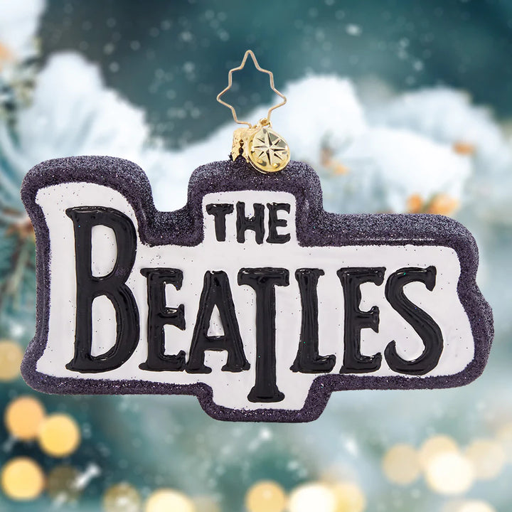 Ornament Description - Bristish Beats: Celebrate this holiday by honoring the most culturally iconic band of all time- The Beatles! Their music has brought joy to millions around the world. Let that joy deck your tree with a bold logo and Union Jack for added flair! Cheers!